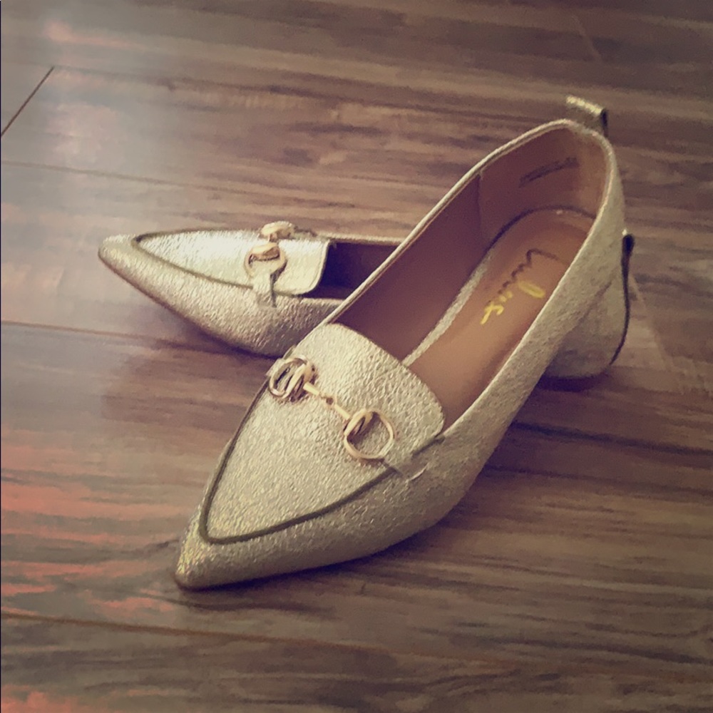 Metallic gold loafers